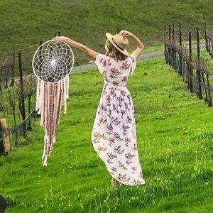 Sheer floral pink top, high low top